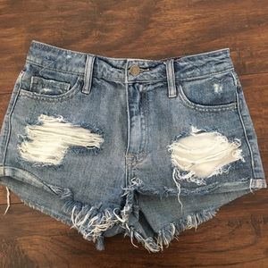 Distressed denim shorts
